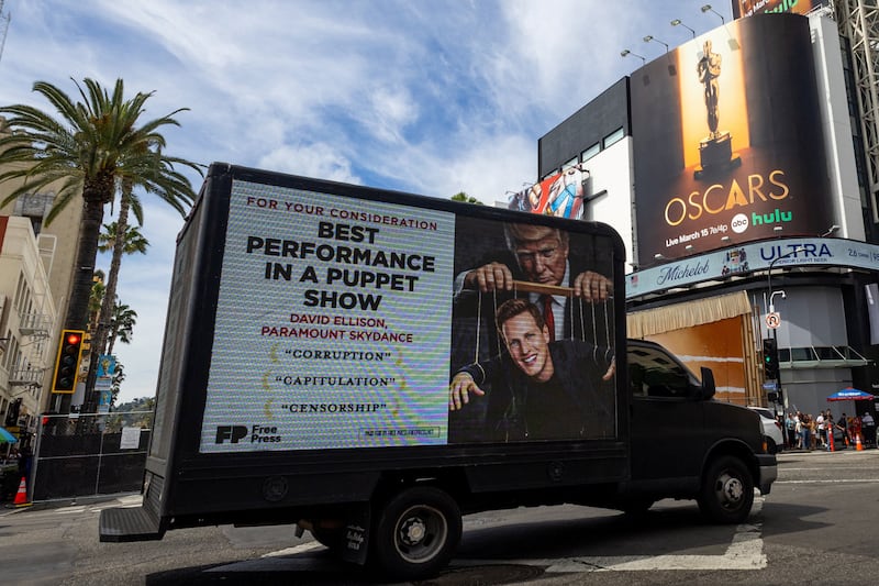 A billboard truck featuring the image of Paramount Skydance CEO David Ellison with U.S. President Donald Trump is driven outside the Dolby Theater’s Hollywood Boulevard location, days before the 98th annual Academy Awards in Hollywood, Los Angeles, California, U.S., March 13, 2026