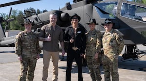 Hegseth and Kid Rock with Apache pilots.
