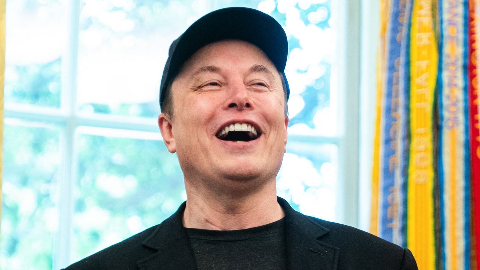 Elon Musk speaks during a news conference with US President Donald Trump in the Oval Office of the White House in Washington, DC, on May 30, 2025. Musk, who stormed into US politics as President Trump's chainsaw-brandishing sidekick, announced on May 28 that he is leaving his role in US government, intended to reduce federal spending, shortly after his first major break with the President over Trump's signature spending bill. (Photo by Allison ROBBERT / AFP) (Photo by ALLISON ROBBERT/AFP via Getty Images)