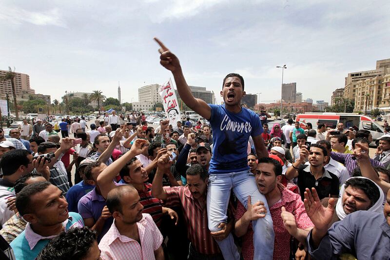 articles/2012/06/01/egypt-s-tahrir-activists-weigh-abandoning-street-protests-for-run-off-vote/tahrir-run-off-dilemma-beach_fjvejo