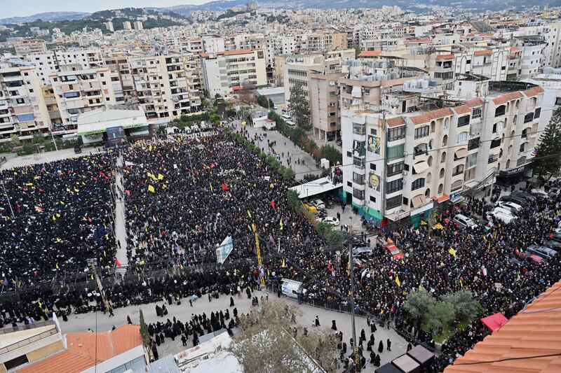 An aerial view of the area where Hezbollah supporters gather holding Iranian flags and posters of Ayatollah Ali Khamenei while chanting anti-U.S. and anti-Israel slogans following the announcement that the Iranian leader was killed in U.S.-Israeli attacks, in the Dahieh district south of Lebanon's capital Beirut on March 01.
