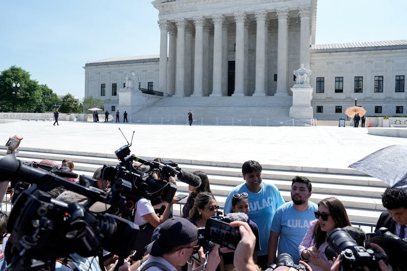 Supporters of the Supreme Court's birthright citizenship ruling gathered outside the building on the final day of the court's term.