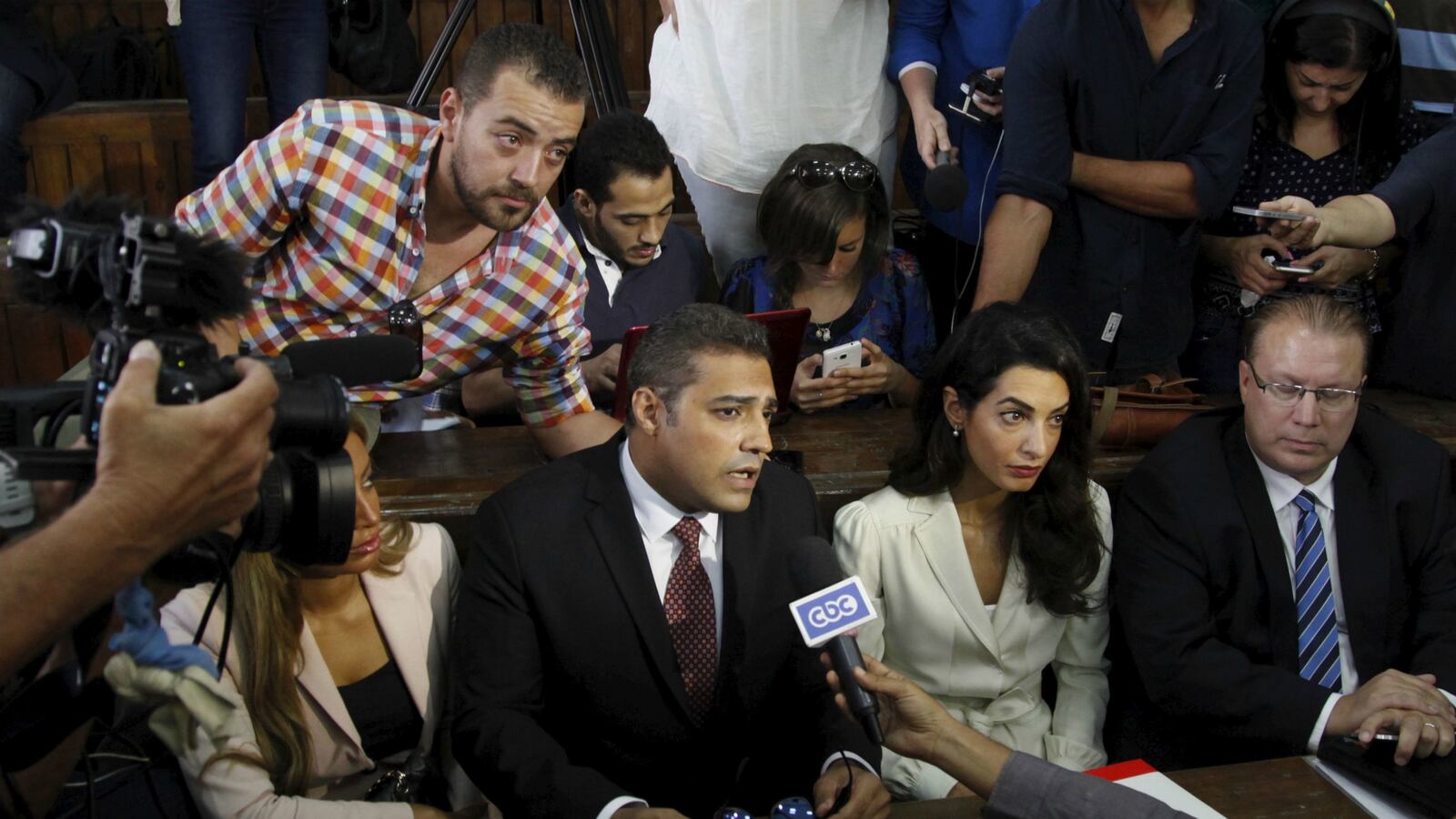 cheats/2015/09/23/egypt-pardons-al-jazeera-journalists/150923-al-jazeera-cheat_rsiras