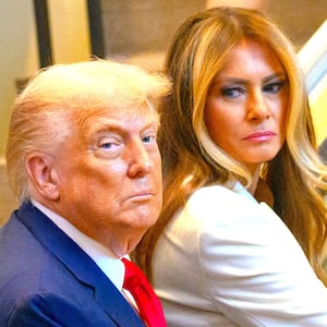 Melania Trump looks back at U.S.  Donald Trump before walking up the escalator after arriving for the 80th session of the UN’s General Assembly (UNGA) on September 23, 2025 in New York City.