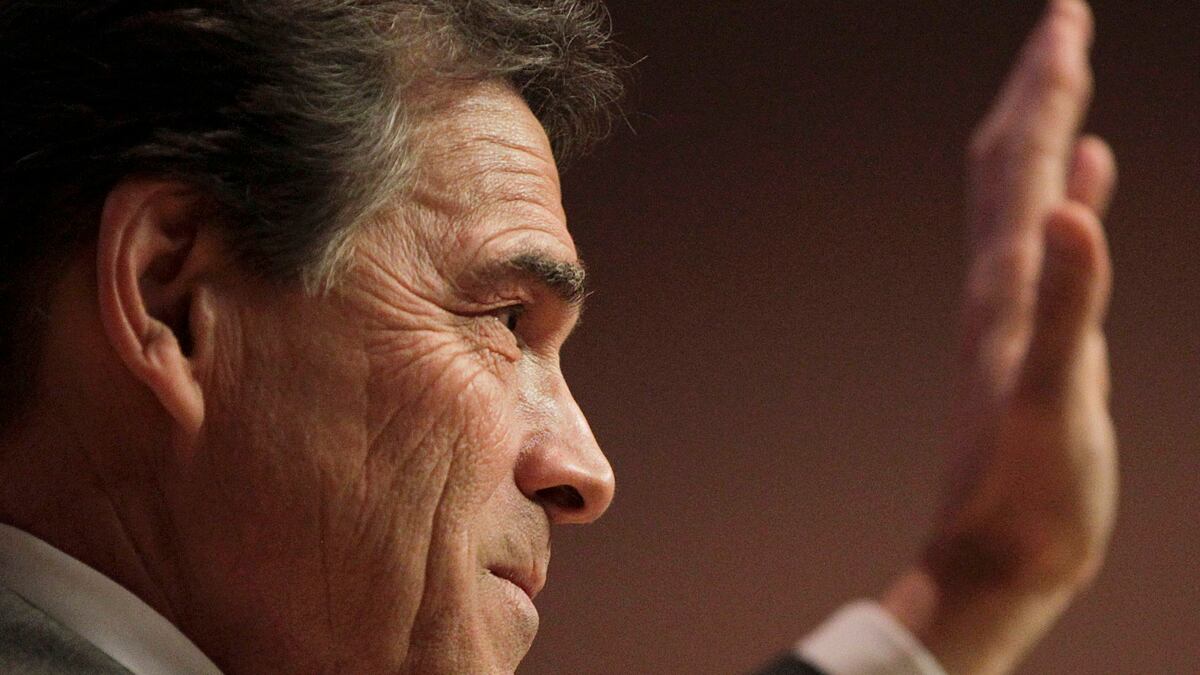 articles/2012/01/03/brownback-rick-perry-s-just-like-john-mccain-in-2008/rick-perry-grove-brownback_diybyt