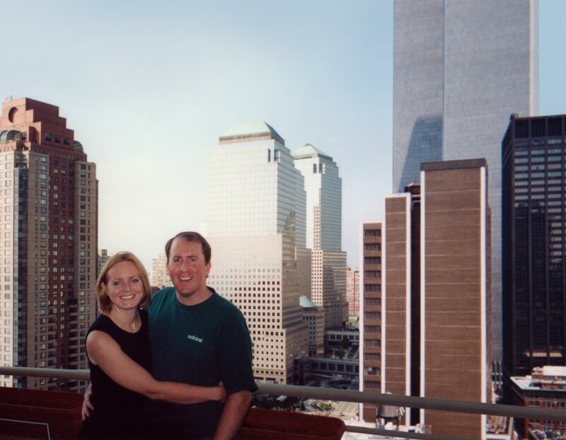Christina Stanton and her husband are photographed on the balcony of their New York City apartment in August 2001.
