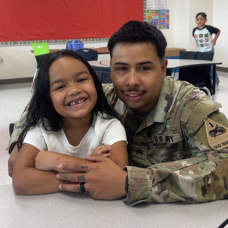 Army Sgt. Hedar Leonel Turcios Juárez and Hazel Camila.