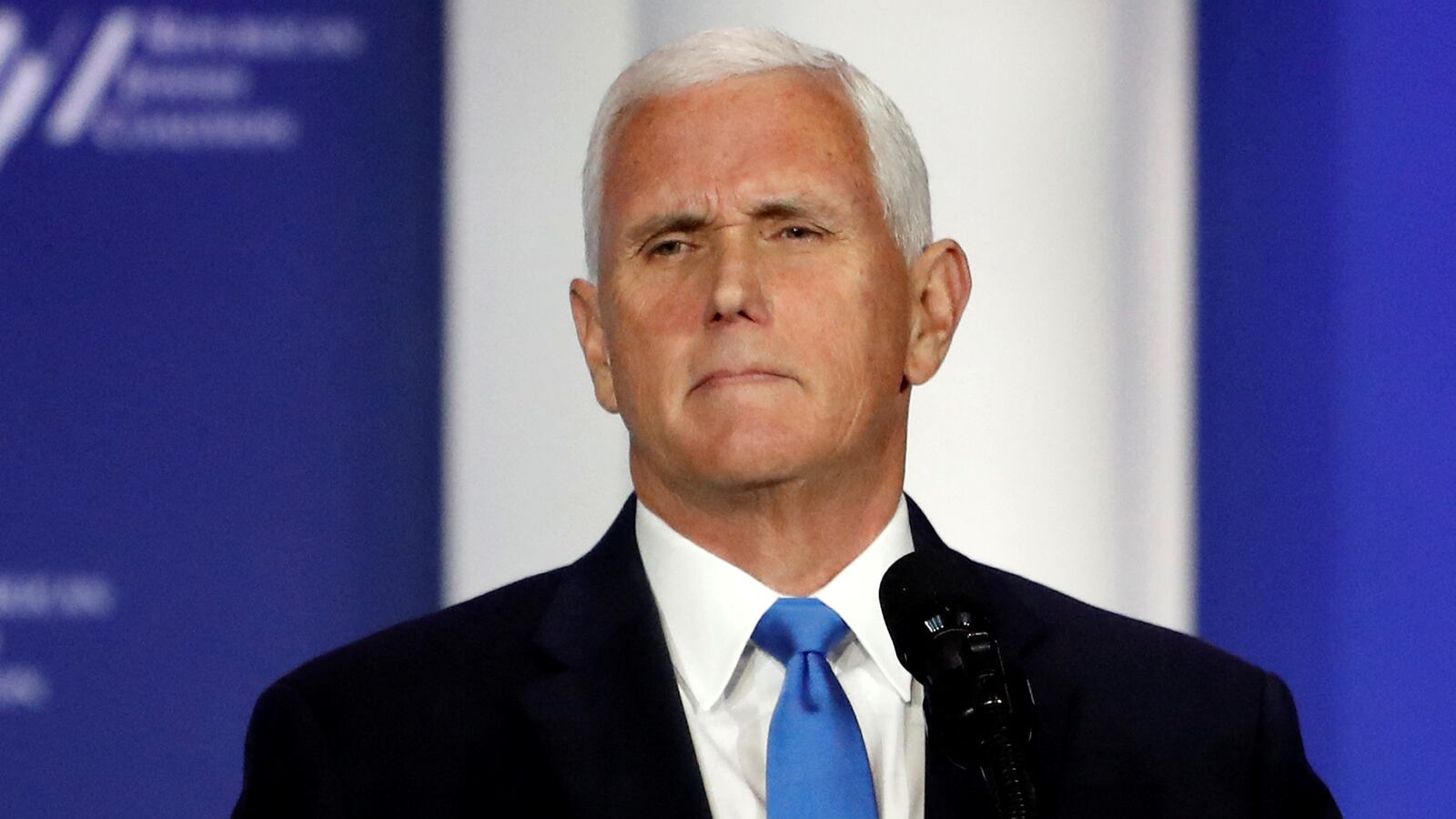 Former U.S. Vice President Mike Pence stands at the podium after announcing he will discontinue his presidential campaign, during the Republican Jewish Coalition Annual Leadership Summit in Las Vegas, Nevada, Oct. 28, 2023.