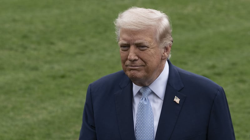 WASHINGTON DC, UNITED STATES - MARCH 20: United States President Donald Trump (L) speaks to the press before his departs the White House en route Miami, Florida on March 20, 2026, in Washington DC. Also The United States Secretary of State Marco Rubio (R) is seen. (Photo by Celal Gunes/Anadolu via Getty Images)