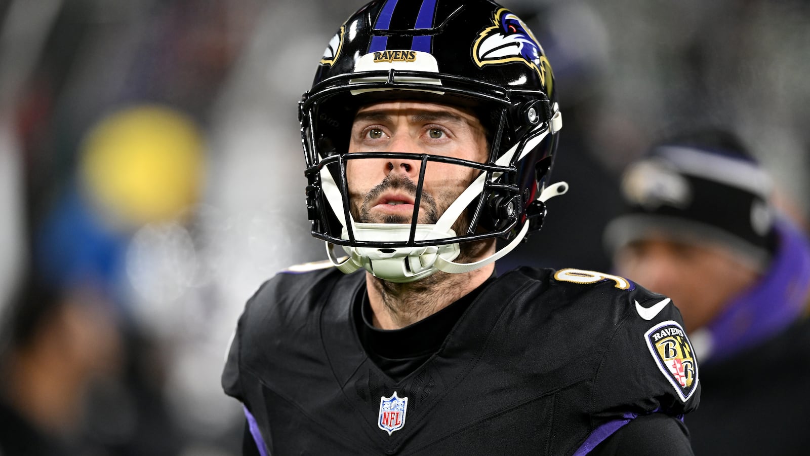 BALTIMORE, MARYLAND - DECEMBER 01: Justin Tucker #9 of the Baltimore Ravens watches the game against the Philadelphia Eagles at M&T Bank Stadium on December 01, 2024 in Baltimore, Maryland. (Photo by G Fiume/Getty Images)