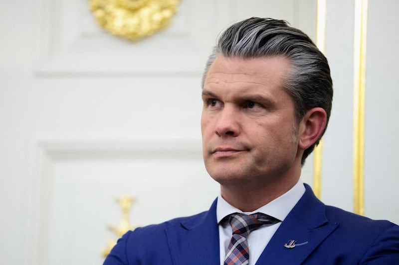 U.S. Secretary of Defense Pete Hegseth attends a Mexican Border Defense Medal presentation in the Oval Office at the White House in Washington, D.C., U.S., December 15, 2025.