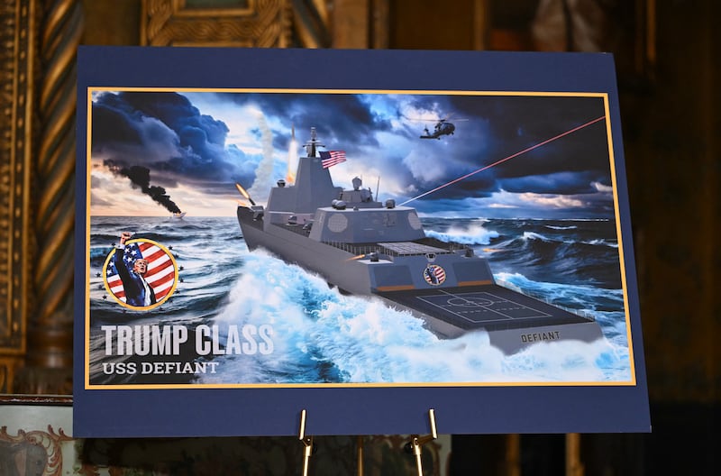A concept rendering of the proposed Trump class USS Defiant is displayed as US President Donald Trump announces the US Navy's new Golden Fleet initiative, unveiling plans for a new class of warships at Mar-a-Lago in Palm Beach, Florida, on December 22, 2025. President Donald Trump on December 22 announced a new class of heavily armed warships that will be named after himself -- an honor usually reserved for US leaders who have left office.
Two of the Trump-class ships will be built initially but that number could grow substantially in the future, according to the president, who said they will be "some of the most lethal surface warfare ships" and "the largest battleship in the history of our country."
Trump made the announcement at his Mar-a-Lago residence in Florida alongside Pentagon chief Pete Hegseth, Secretary of State Marco Rubio and Navy Secretary John Phelan, with images of the planned high-tech vessels on stands nearby. (Photo by ANDREW CABALLERO-REYNOLDS / AFP via Getty Images)