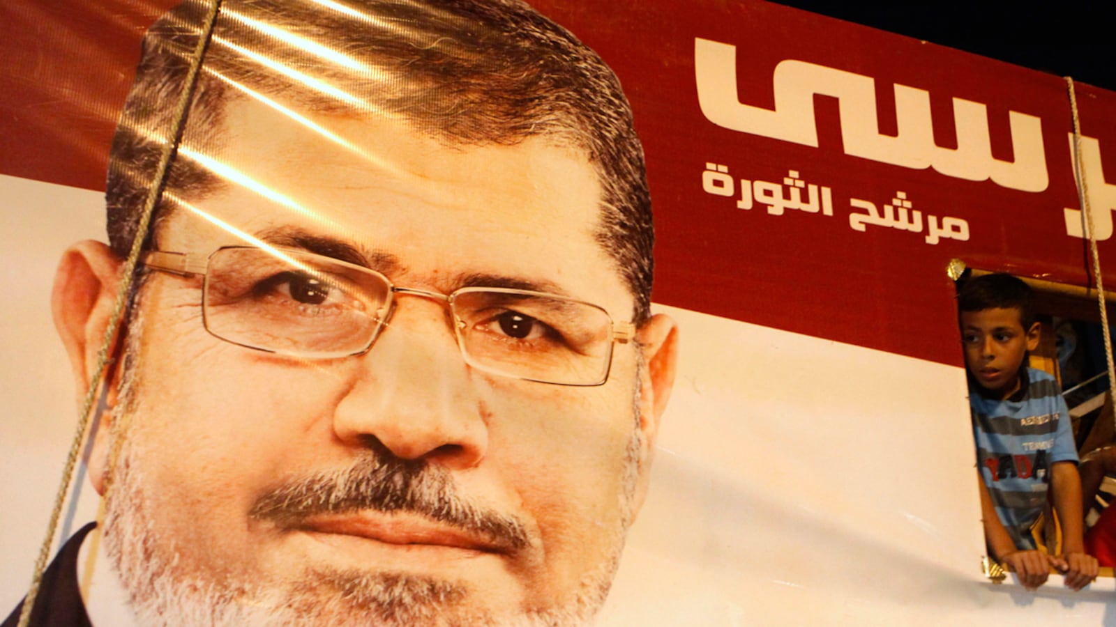 articles/2012/07/11/egypt-s-overhyped-parliamentary-showdown/egypt-political-theater-khalil_ezodrn