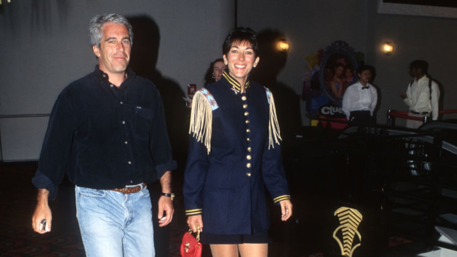 Jeffrey Epstein and Ghislaine Maxwell attend the “Batman Forever” premiere.