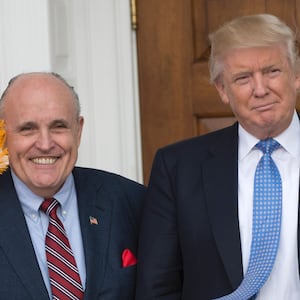 President-elect Donald Trump meets with former New York City Mayor Rudy Giuliani at the clubhouse of Trump National Golf Club November 20, 2016 in Bedminster, New Jersey. / AFP / Don EMMERT (Photo credit should read DON EMMERT/AFP via Getty Images)