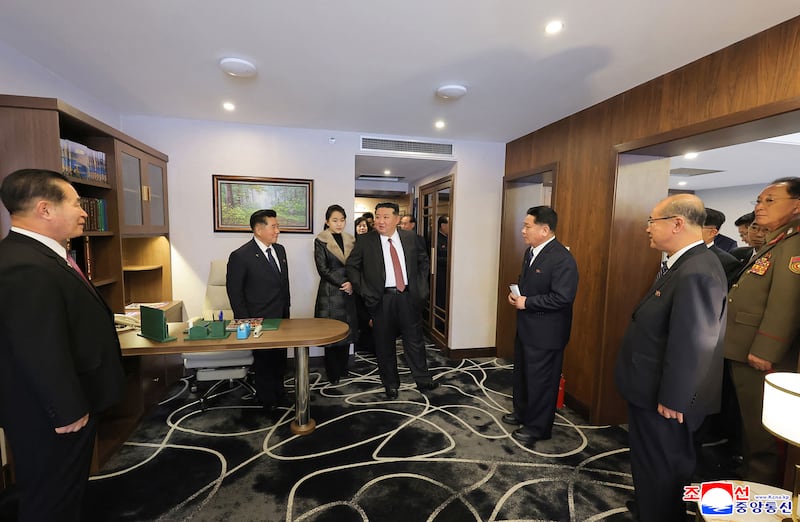 This picture taken on December 20, 2025 and released by North Korea's official Korean Central News Agency (KCNA) via KNS on December 23, 2025 shows North Korean leader Kim Jong Un (L) and his daughter Ju Ae inspecting the Ikkal Hotel, which was recently completed in the Samjiyon tourist district of Ryanggang Province. (Photo by KCNA VIA KNS / AFP via Getty Images) / South Korea OUT / ---EDITORS NOTE--- RESTRICTED TO EDITORIAL USE - MANDATORY CREDIT "AFP PHOTO/KCNA VIA KNS" - NO MARKETING NO ADVERTISING CAMPAIGNS - DISTRIBUTED AS A SERVICE TO CLIENTS
THIS PICTURE WAS MADE AVAILABLE BY A THIRD PARTY. AFP CAN NOT INDEPENDENTLY VERIFY THE AUTHENTICITY, LOCATION, DATE AND CONTENT OF THIS IMAGE. /