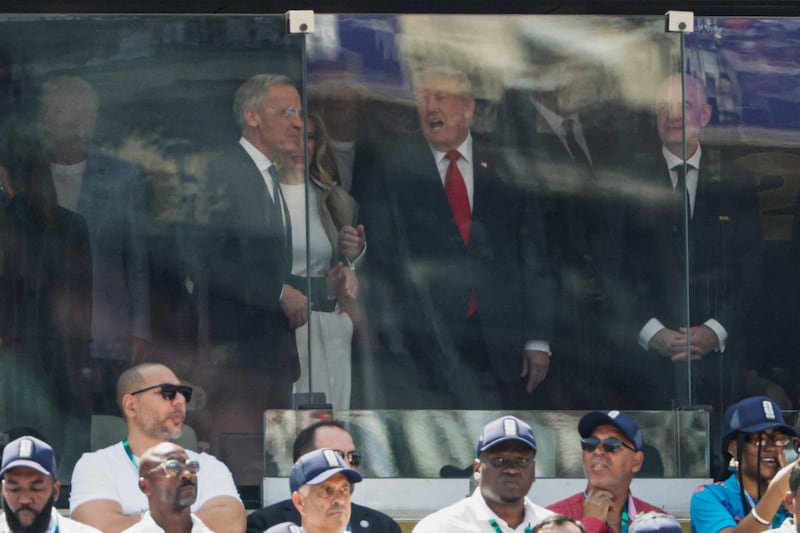 U.S. President Donald Trump speaks with Canada's Prime Minister Mark Carney next to FIFA President Gianni Infantino before the FIFA World Cup 2026 Final between Spain and Argentina at New York New Jersey Stadium in East Rutherford, New Jersey, U.S., July 19, 2026. REUTERS/Evan Vucci