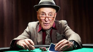 A photo illustration of Sen. Chuck Schumer playing poker.