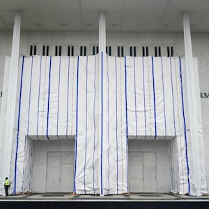 A tarp covers the facade of the John F. Kennedy Memorial Center for the Performing Arts, following a federal judge’s order to remove U.S. President Donald Trump's name from the institution.