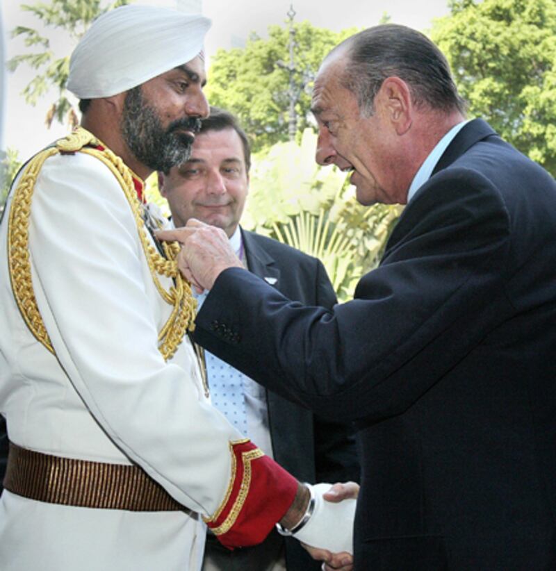 galleries/2011/03/07/gaddafi-or-hotel-doorman/gaddafi-doorman-6-answer_ztxu8k