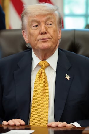 WASHINGTON, DC - MAY 06: U.S. President Donald Trump looks on during an event in the Oval Office of the White House on May 06, 2026 in Washington, DC. Trump was joined by UFC fighters to talk about the June 14th UFC Freedom 250 match to be held outside the White House. (Photo by Anna Moneymaker/Getty Images)
