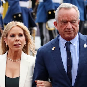 Health and Human Services Secretary Robert F. Kennedy Jr. (2nd R) and his wife, Cheryl Hines, arrive for the inauguration of Ecuador's re-elected President Daniel Noboa at the National Assembly in Quito on May 24, 2025.
