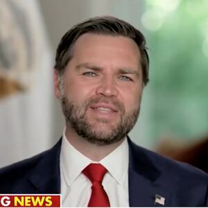 JD Vance smiles while discussing failed attempts to avoid a government shutdown.