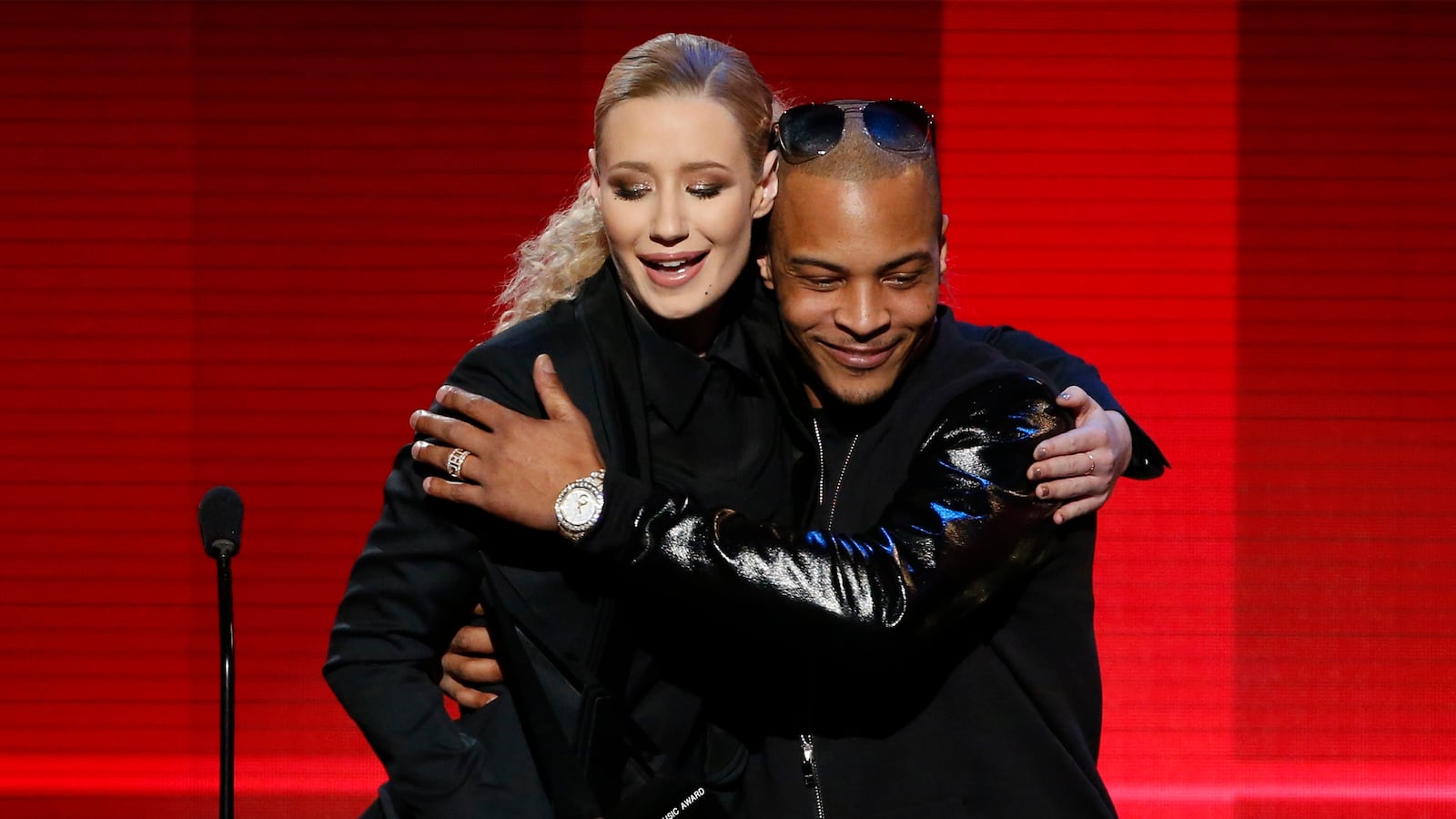 articles/2015/09/18/what-drove-t-i-and-iggy-azalea-apart/150918-zimmerman-iggy-ti-tease_nu2pis