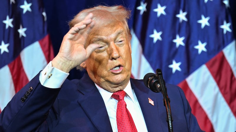 US President Donald Trump reacts as he speaks during the House Republican Party (GOP) member retreat at the Kennedy Center in Washington, DC, on January 6, 2026. (Photo by Mandel NGAN / AFP via Getty Images)