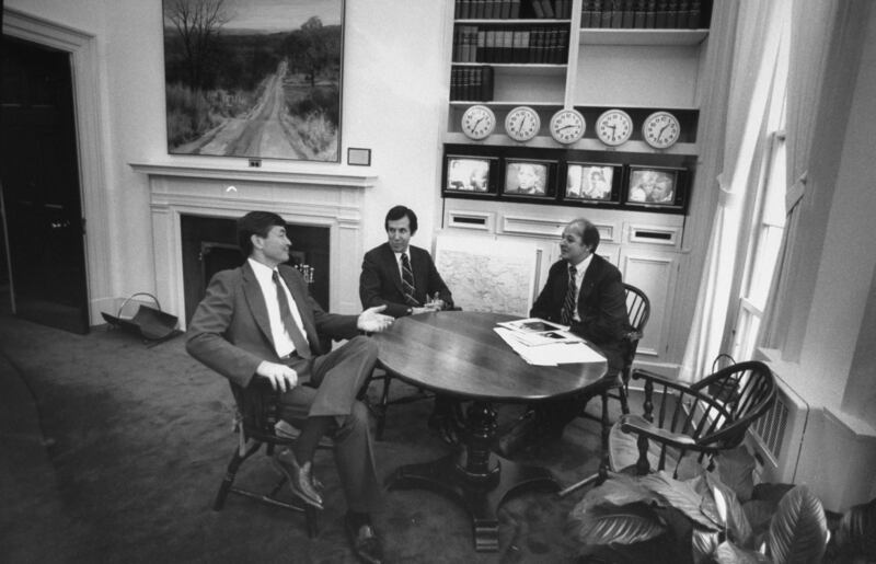White House Press Secretary James Brady with CBS newscaster Bill Plante and NBC newscaster Chris Wallace in the White House press office.    (Photo by Dick Swanson/Getty Images)