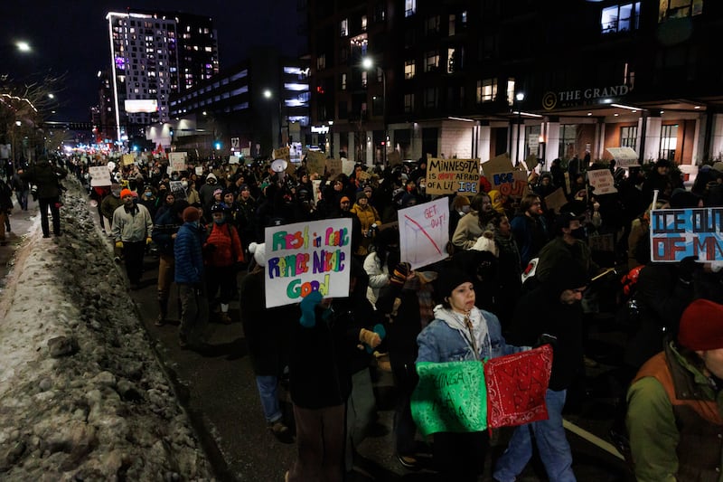 Over a thousand people marched through downtown Minneapolis during a protest against the deployment of U.S. Immigration and Customs Enforcement agents January 9, 2026.