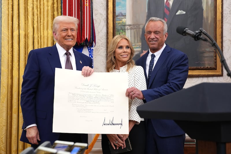 President Donald Trump, Robert F. Kennedy Jr., and Kennedy's wife Cheryl Hines 2025