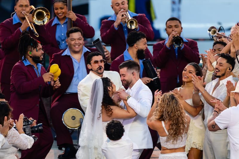Bad Bunny performs in front of a wedding couple in the halftime show during the Seattle Seahawks versus the New England Patriots Super Bowl LX game on February 8, 2026, at Levi's Stadium in Santa Clara, CA.
