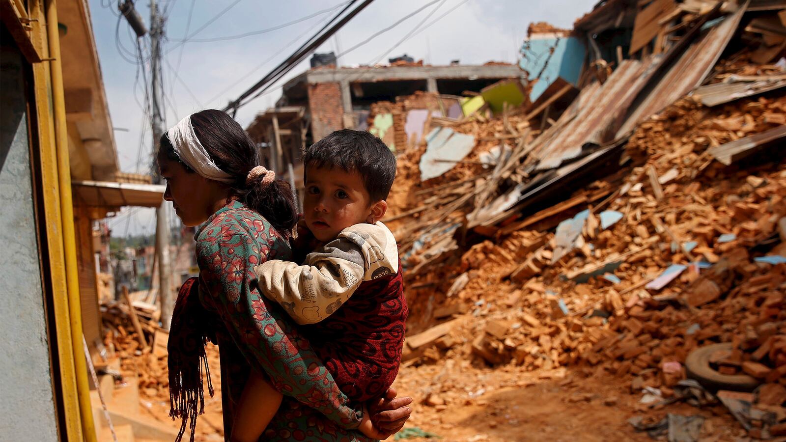 articles/2015/11/02/in-nepal-the-pols-play-their-game-of-thrones-but-winter-is-coming/151101-dunham-nepal-tease_ltdb6v