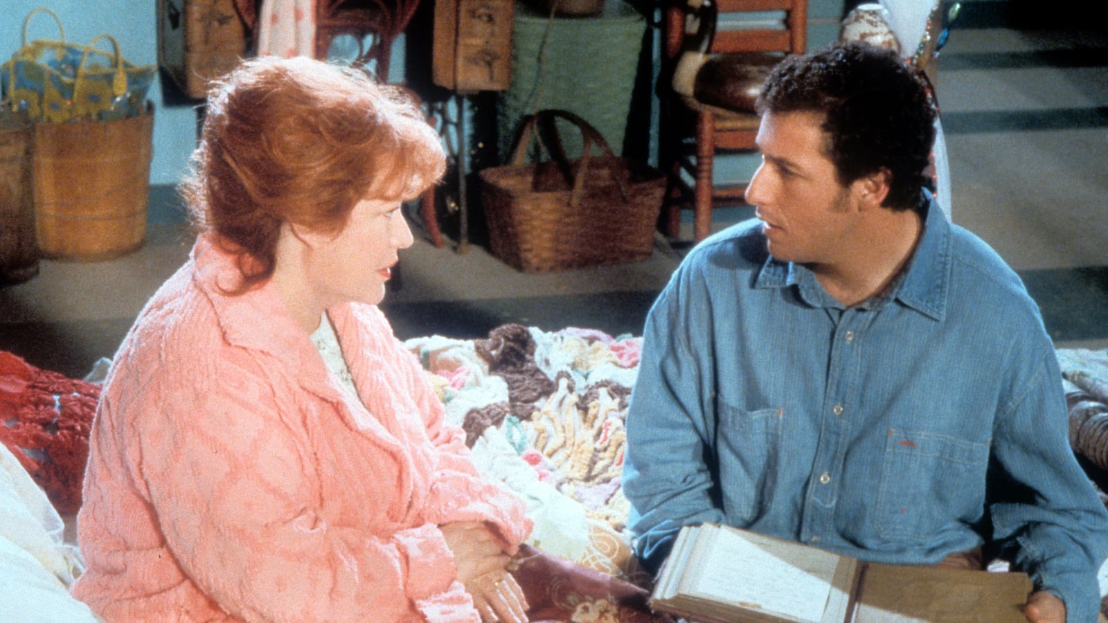 Kathy Bates talks to Adam Sandler in a scene from the film 'The Waterboy', 1998.