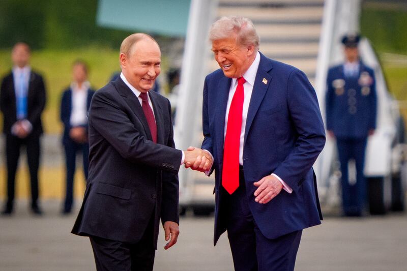 Trump greets Putin in Alaska
