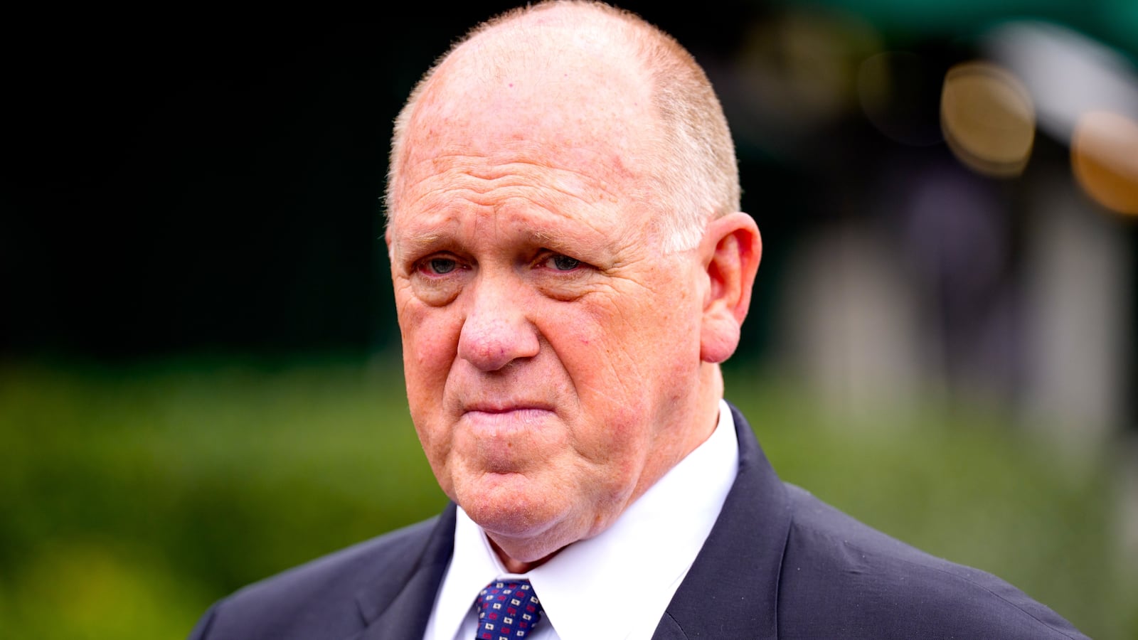 White House border czar Tom Homan takes a question from members of the media as he walks back towards the West Wing of the White House following a television interview on May 29, 2025 in Washington, DC.