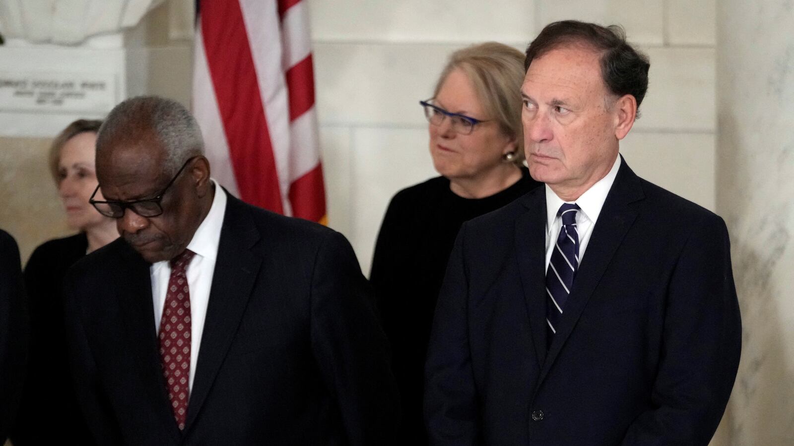 Supreme Court Justice Clarence Thomas and Justice Samuel Alito attend a private ceremony for retired Supreme Court Justice Sandra Day O’Connor before public repose in the Great Hall at the Supreme Court in Washington, Monday, Dec. 18, 2023.