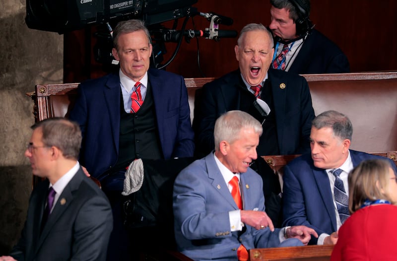 Rep. Andy Biggs (R-AZ) (R) yawns as he and Rep. Scott Perry (R-PA (L)) wait for the start of the Union address during a Joint Session of Congress at the U.S. Capitol on February 24, 2026, in Washington, DC.