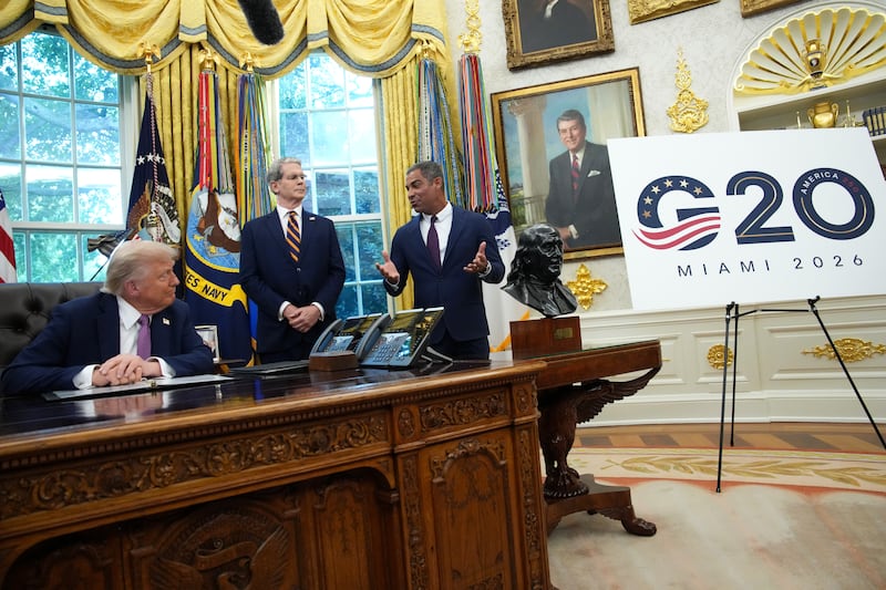 WASHINGTON, DC - SEPTEMBER 05: Miami Mayor Francis Suarez (R) speaks as U.S. President Donald Trump announces plans to host the 2026 G20 summit in Miami, Florida while U.S. Treasury Secretary Scott Bessent (C) looks on during a press availability in the Oval Office of the White House on September 05, 2025 in Washington, DC. President Trump detailed his administration's plans to host the 2026 Group of 20 summit of world leaders at his golf course and spa in Doral, Florida. (Photo by Kevin Dietsch/Getty Images)