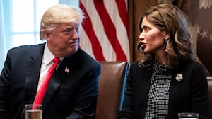 President Donald J. Trump speaks with Kristi Noem.