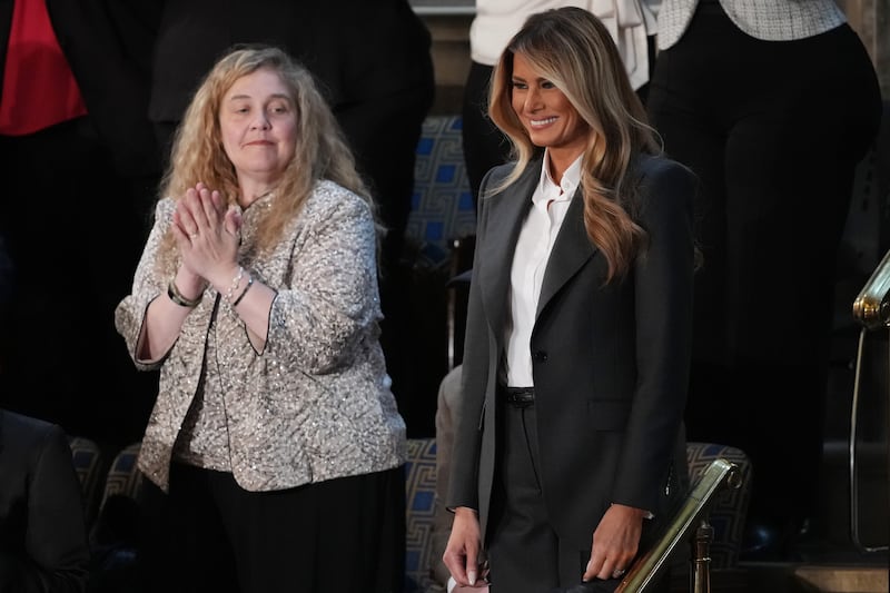First Lady Melania Trump smiles as her husband delivers his State of the Union address during a Joint Session of Congress at the U.S. Capitol on February 24, 2026.
