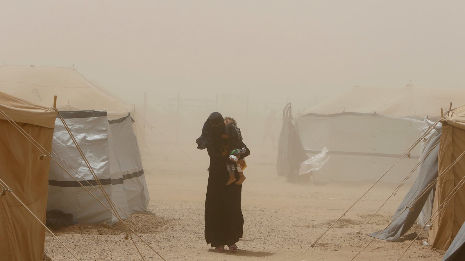 articles/2016/08/25/isis-provokes-a-backlash-against-the-veil/1608225-niqash-iraq-isis-tease_cqoghf