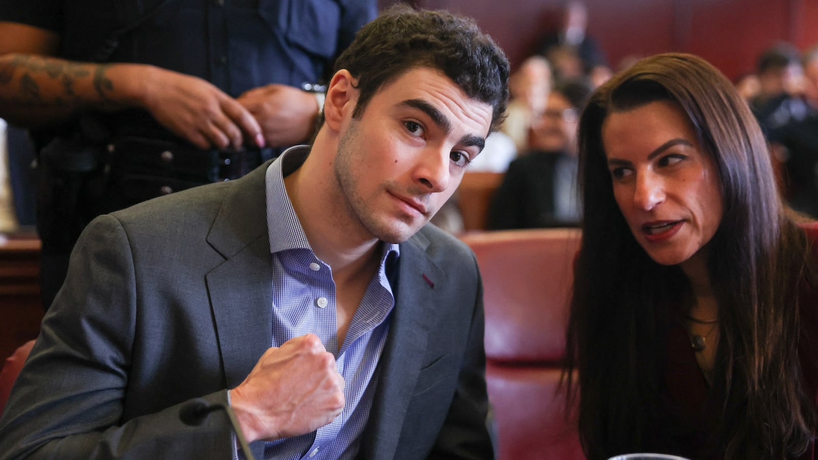 Luigi Mangione (L) appears in Manhattan Supreme Court alongside his attorney Karen Friedman Agnifilo.