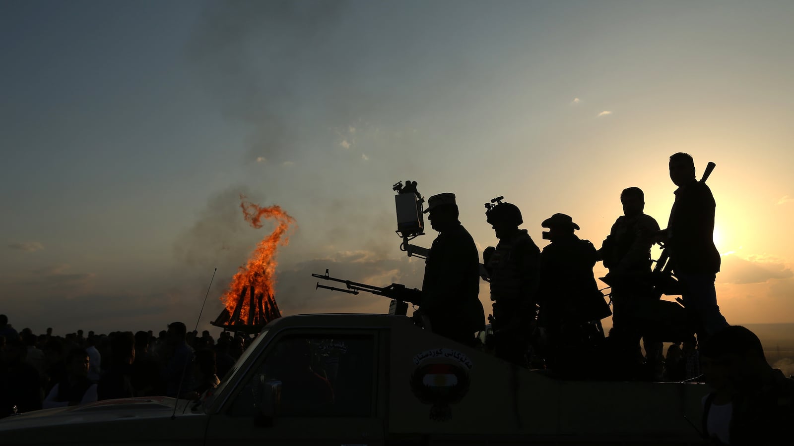 articles/2015/03/25/isis-threatens-to-burn-21-men-alive/150322-wolf-iraq-lights-festival-tease_aqueks