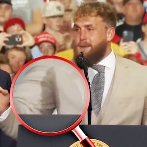 A photo illustration of a magnifying glass on Jake Paul's sweat stains while on stage with Donald Trump in Kentucky.