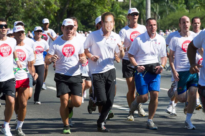 articles/2012/03/10/harry-wears-william-mask-on-fun-run/prince-harry-brazil-charity-run-mask-royalist-sykes_ppzllg