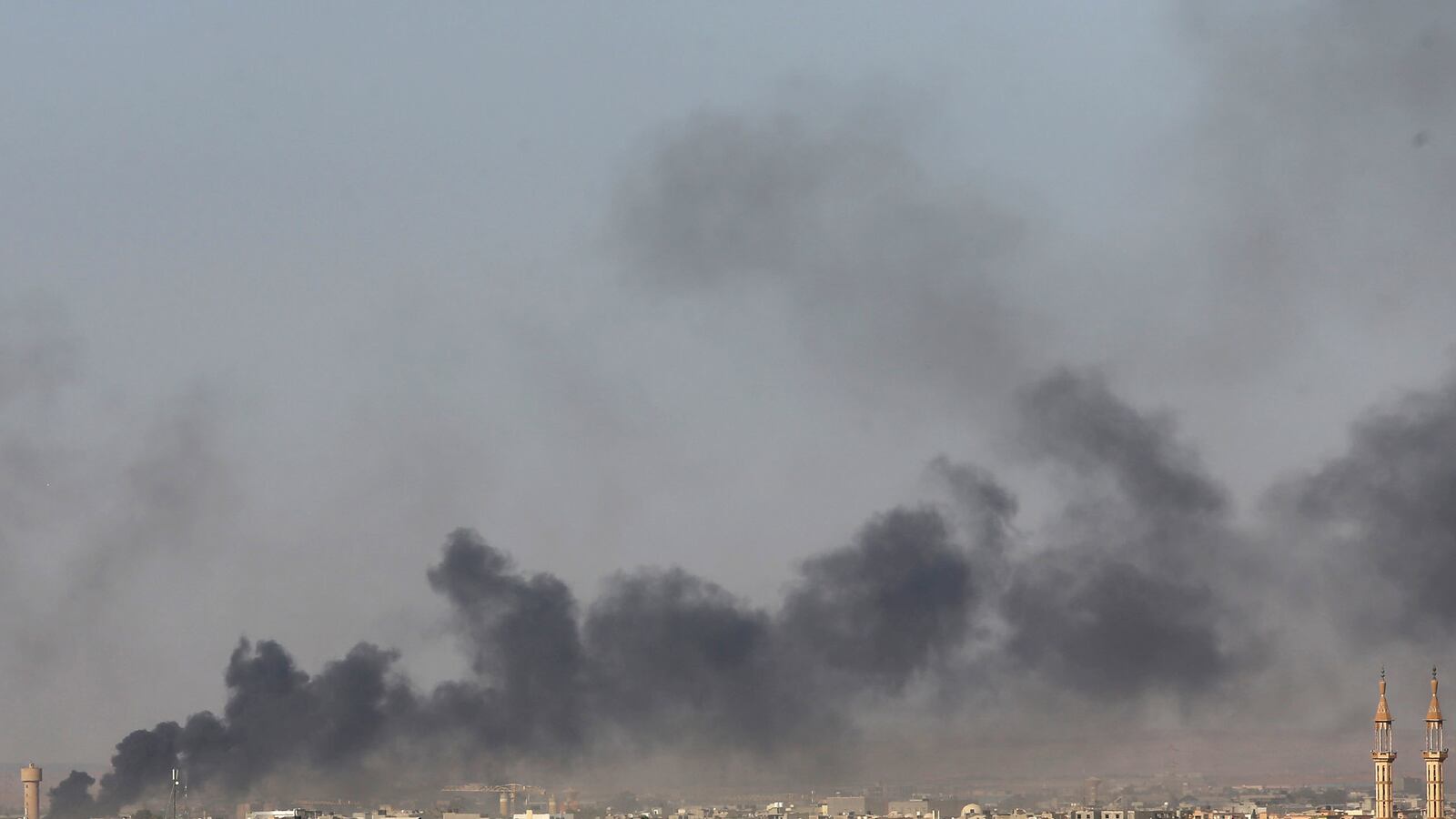 articles/2014/07/27/u-s-diplomats-and-marines-close-embassy-and-flee-libya-fighting/140727-dettmer-libya-tease_bnpms0