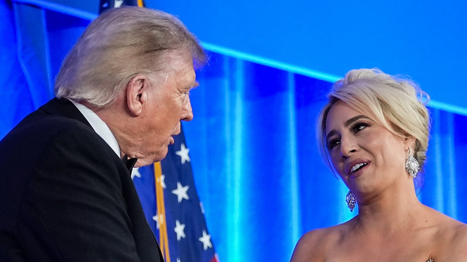 WASHINGTON, DC - JULY 24: U.S. President Donald Trump greets White House Correspondents Association President Jacqui Heinrich during the re-scheduled White House Correspondents Dinner in the Presidential Ballroom at the Waldorf Astoria on July 24, 2026 in Washington, DC. The annual gala hosted by the White House Correspondents Association was re-scheduled to tonight after the original event in April was cut short when an armed man, later identified as Cole Tomas Allen, attempted to get past a Secret Service checkpoint. (Photo by Eric Lee/Getty Images)