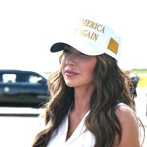 US President Donald Trump, alongside Secretary of Homeland Security Kristi Noem